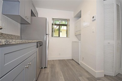 Move-in ready 1-bedroom, 1-bath first-floor condo in the