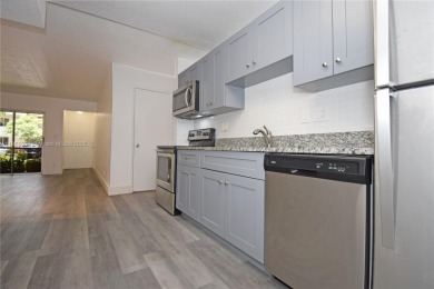 Move-in ready 1-bedroom, 1-bath first-floor condo in the