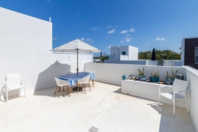 Immaculate, almost new 4/4 townhouse right across the street