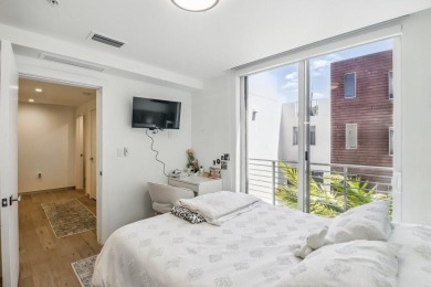 Immaculate, almost new 4/4 townhouse right across the street