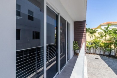 Immaculate, almost new 4/4 townhouse right across the street