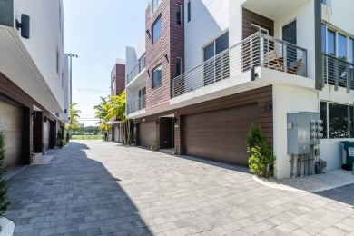 Immaculate, almost new 4/4 townhouse right across the street