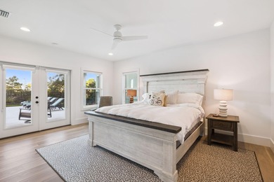 Completed in 2024, this stunning harborfront home offers the