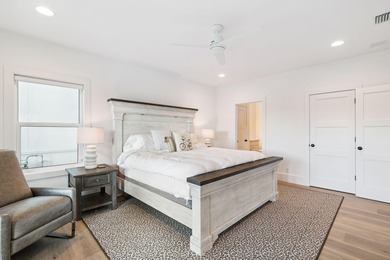 Completed in 2024, this stunning harborfront home offers the