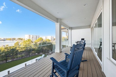 Completed in 2024, this stunning harborfront home offers the