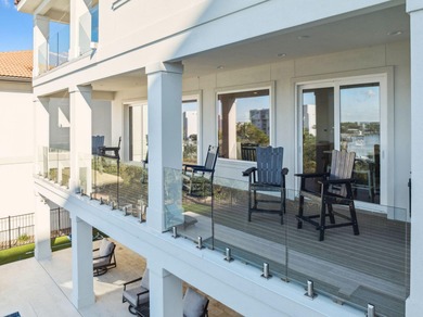 Completed in 2024, this stunning harborfront home offers the