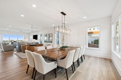 Completed in 2024, this stunning harborfront home offers the