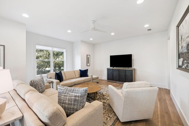 Completed in 2024, this stunning harborfront home offers the