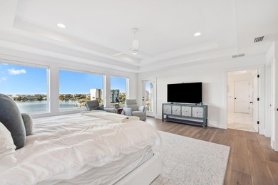 Completed in 2024, this stunning harborfront home offers the