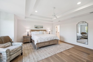 Completed in 2024, this stunning harborfront home offers the