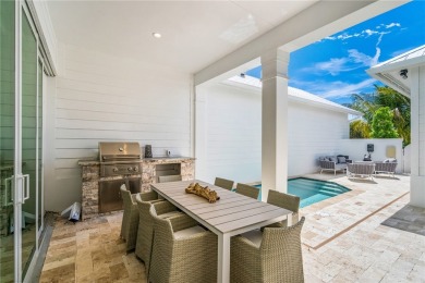 A modern twist on Key West style, this luxury cottage beckons