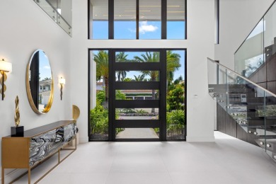 1955 Thatch Palm in Royal Palm Yacht & Country Club is a