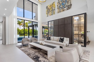 1955 Thatch Palm in Royal Palm Yacht & Country Club is a