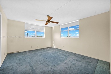 Spacious 2 bedroom, 2 bath corner condo with 1,168 sq. ft. of