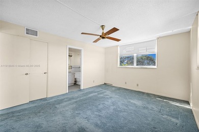 Spacious 2 bedroom, 2 bath corner condo with 1,168 sq. ft. of