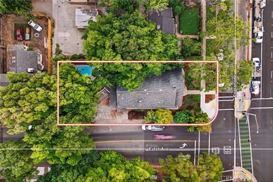 Discover a rare investment opportunity with two charming homes