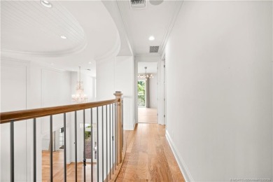 Experience waterfront luxury in this Riverbend original model