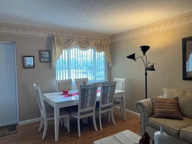 Beautiful 2 bedroom condo with a covered screened porch with new