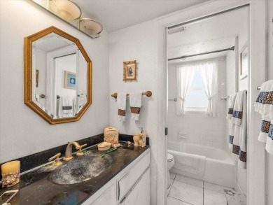 Delight in the epitome of beachfront luxury with this enchanting