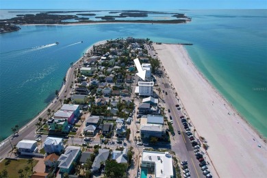 Delight in the epitome of beachfront luxury with this enchanting