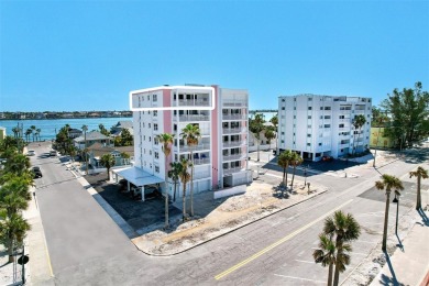 Delight in the epitome of beachfront luxury with this enchanting