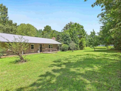 This Monticello gem truly has it all! Situated on 1.8