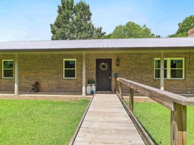 This Monticello gem truly has it all! Situated on 1.8