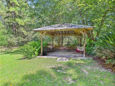 This Monticello gem truly has it all! Situated on 1.8