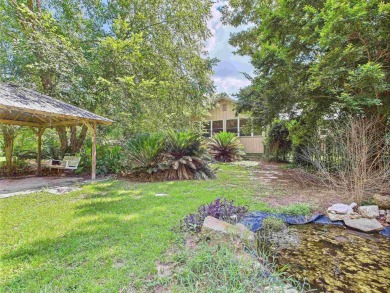 This Monticello gem truly has it all! Situated on 1.8