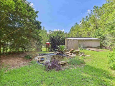 This Monticello gem truly has it all! Situated on 1.8