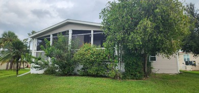 Manufactured Home on leased land with lot rent. This beautifully