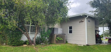 Manufactured Home on leased land with lot rent. This beautifully