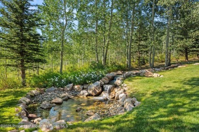 Perched atop Ridge Run on a private 3/4-acre lot, this Michael