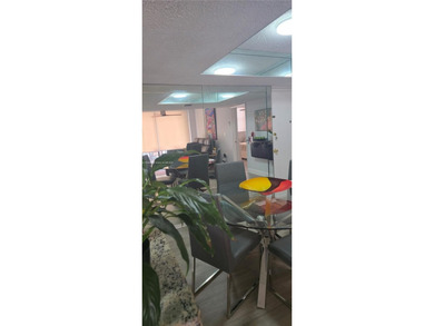 Don't miss out on remodeled 2/2 condo , wood floors throughout