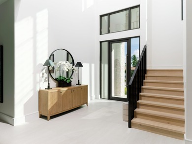 Balancing modern elegance with a true waterfront lifestyle, this