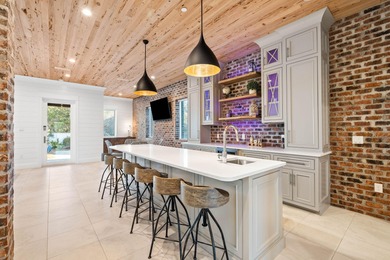 Positioned along the iconic Scenic Highway 30A, 3325 E County