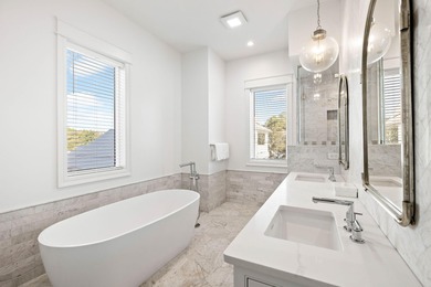 Positioned along the iconic Scenic Highway 30A, 3325 E County