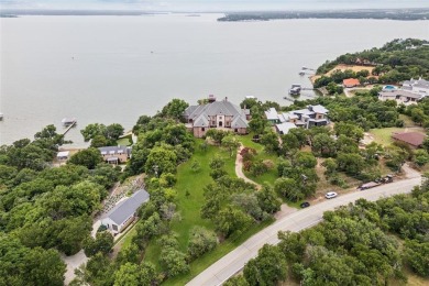 Experience the pinnacle of lakeside luxury in this extraordinary