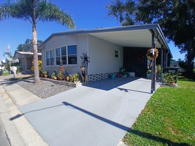 Welcome to this beautifully maintained doublewide mobile home