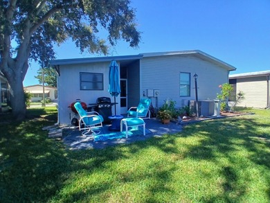 Welcome to this beautifully maintained doublewide mobile home