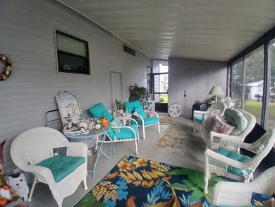Welcome to this beautifully maintained doublewide mobile home