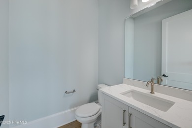 Discover unparalleled coastal living in this stunning newly