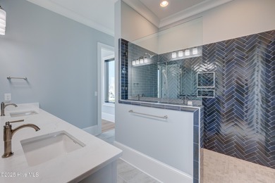 Discover unparalleled coastal living in this stunning newly