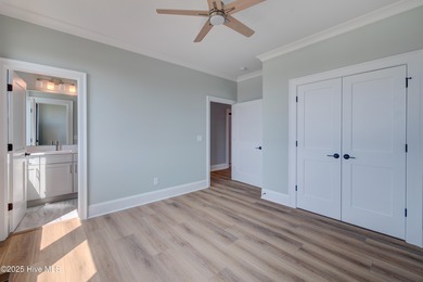 Discover unparalleled coastal living in this stunning newly