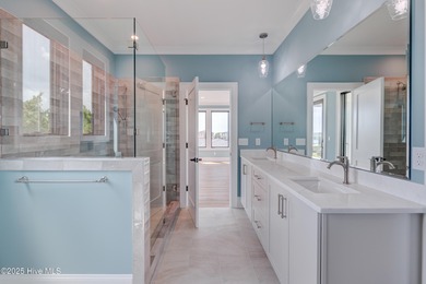 Discover unparalleled coastal living in this stunning newly