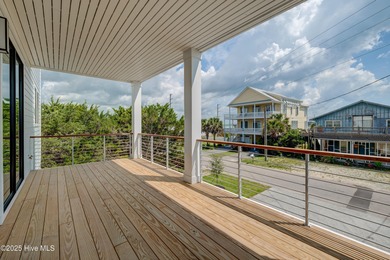 Discover unparalleled coastal living in this stunning newly