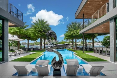 An unparalleled gated waterfront estate located on the deep