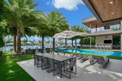 An unparalleled gated waterfront estate located on the deep