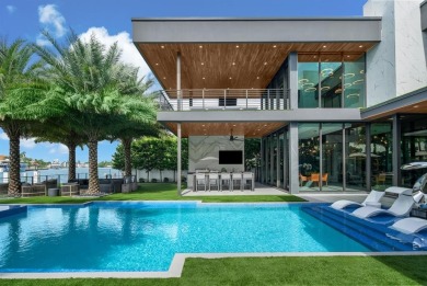 An unparalleled gated waterfront estate located on the deep