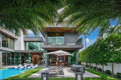 An unparalleled gated waterfront estate located on the deep